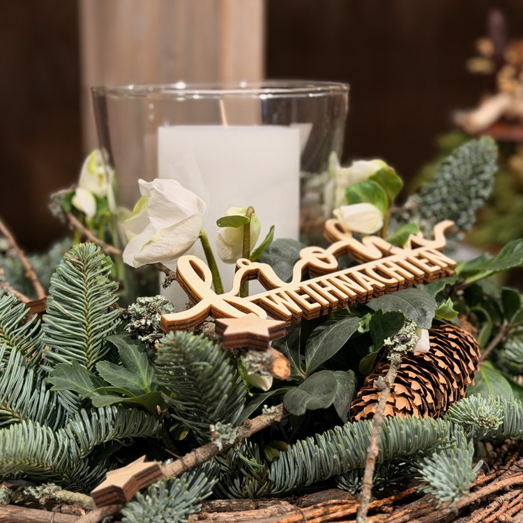 Gesteck mit Weihnachtsgruß